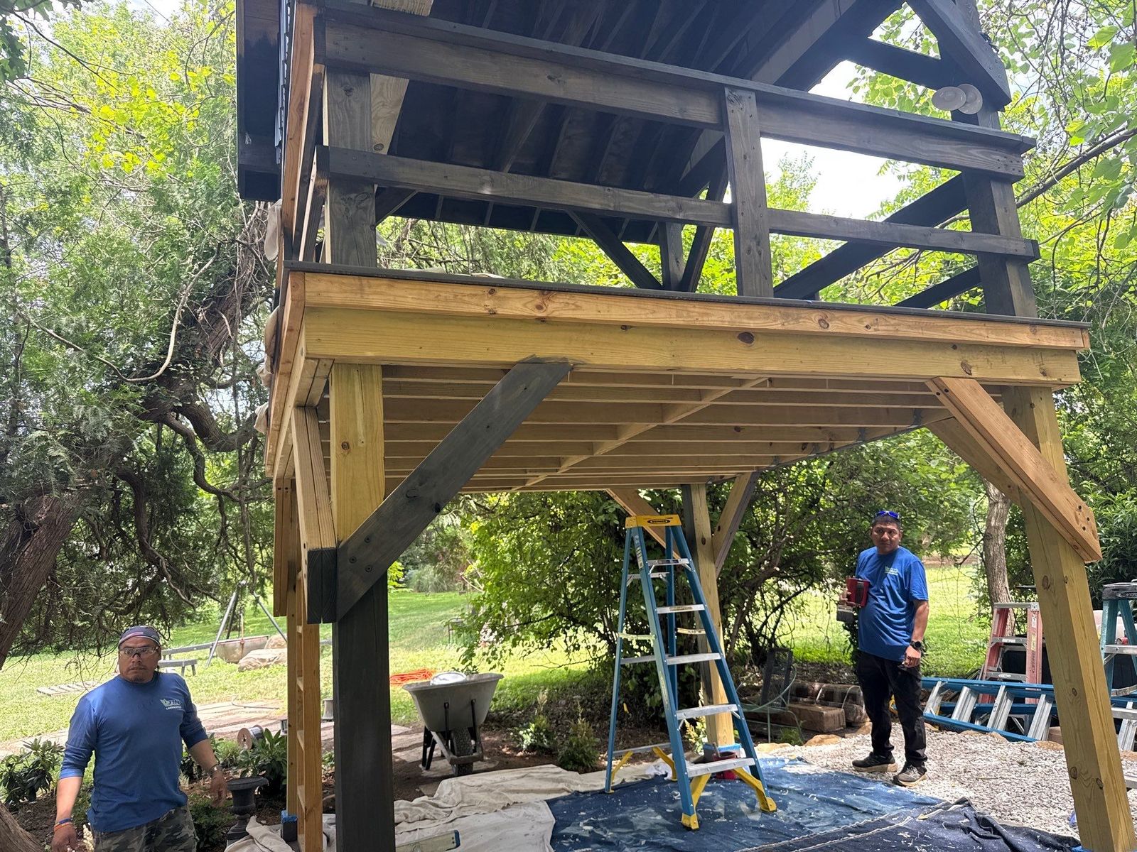 JHL crew framing an elevated second-story covered wood deck at a backyard near Newtown Square, PA